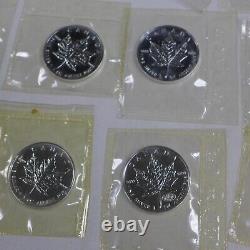 Lot of (14) 1988-2001 1oz Canada Maple Leaf Coins Sealed in original plastic