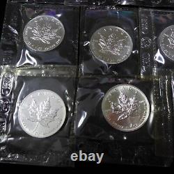 Lot of (14) 1988-2001 Canada $5 Maple Leaf 1oz. 9999 Silver Coins Sealed