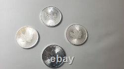 Lot of 4 Silver Canada 1 oz. 9999 Silver Maple Leaf $5 Coins Years 14,22 & 23