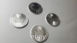 Lot of 4 Silver Canada 1 oz. 9999 Silver Maple Leaf $5 Coins Years 14,22 & 23